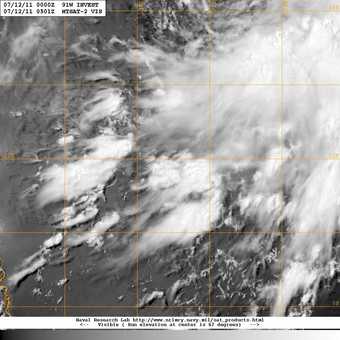 20110712.0501.mtsat2.x.vis1km_high.91WINVEST.15kts-1010mb-117N-1309E.100pc.jpg